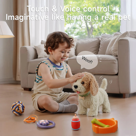 Young child sitting on the floor indoors, petting a battery-operated toy dog that stands and wags its tail; scattered nearby are its accessories: a colorful rope ball, paw-print remote with orange cable, toy bottle, and dog bowl with a bone toy, with overlay text ‘Touch & Voice control Imaginative like having a real pet’ and a speech bubble ‘Woof!’.