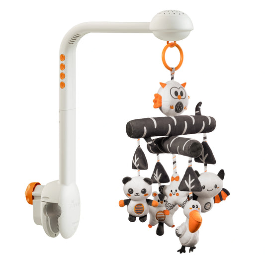 White musical crib mobile with clamp-on arm and built-in projector, hanging black-and-white plush woodland animals and trees with orange accents