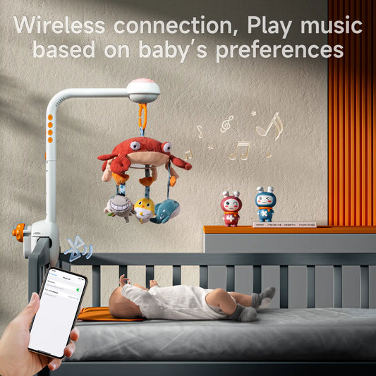 A baby lying in a crib looking up at a Bluetooth-enabled crib mobile featuring a plush crab and hanging sea animals. A hand holds a smartphone connected to the mobile, playing music wirelessly based on the baby’s preferences. Musical notes and icons illustrate the sound feature.