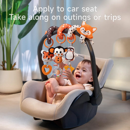 Cute fox spiral toy fixed on the car seat, baby is playing with the plush toy hanging from the spiral toy