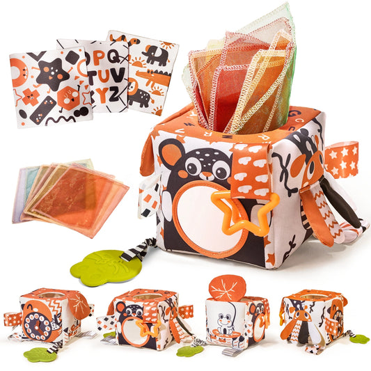 Soft fabric Montessori tissue box toy cube with animal prints, featuring pull-out crinkle mesh panels, silicone teethers, ribbon tags, a star-shaped teether, and peekaboo mirror panels for sensory exploration