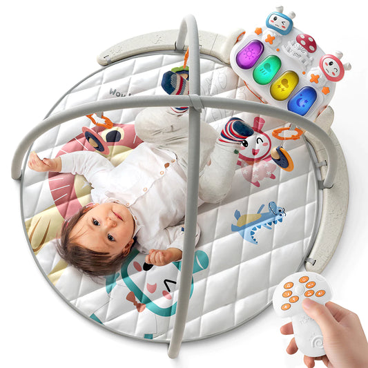 Baby play gym with soft padded mat featuring animal prints, hanging rattles, and a light-up musical keyboard, controlled by a handheld remote.