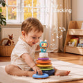 Baby playing with a 3 in 1 musical stacking rings toy with music, lights and stacking rings