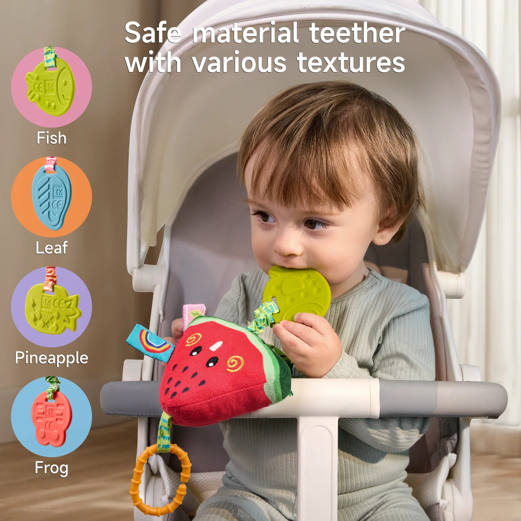 Four fruit-themed hanging toys attached to various baby gear: a car seat, stroller, play gym, and crib. Each plush toy features fruit designs like pomegranate, apple, pear, and watermelon, along with textured teethers and secure attachment clips. A close-up of the clip showcases its durability. Text highlights the toys' ease of attachment.