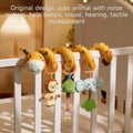 Plush giraffe-themed spiral toy wrapped around a white crib rail, featuring hanging soft animal figures and sensory elements like a rattle and teether, designed to stimulate baby's visual, auditory, and tactile development.