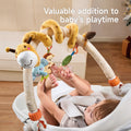 A baby happily touches and plays with a colorful baby arch toy attached to a baby seat. Featuring a plush giraffe, monkey, elephant, and a rattle, the toy offers engaging textures and fun elements. The secure clips keep the arch in place, making it perfect for travel or home use.