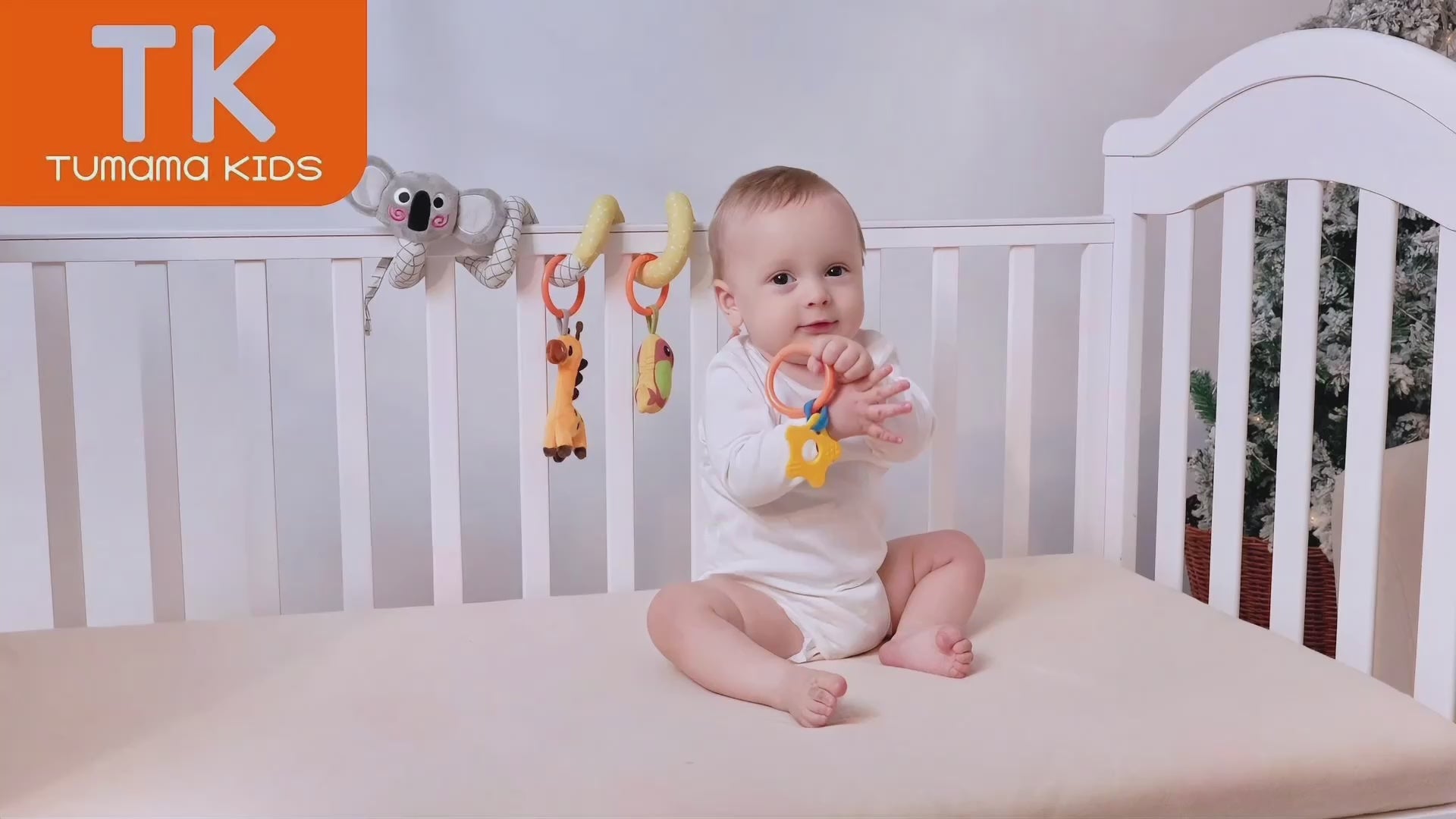 Baby-chews-and-plays-with-these-removable-baby-hanging-toys