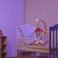 Baby-playing-and-sleeping-with-the-projection-night-light-on