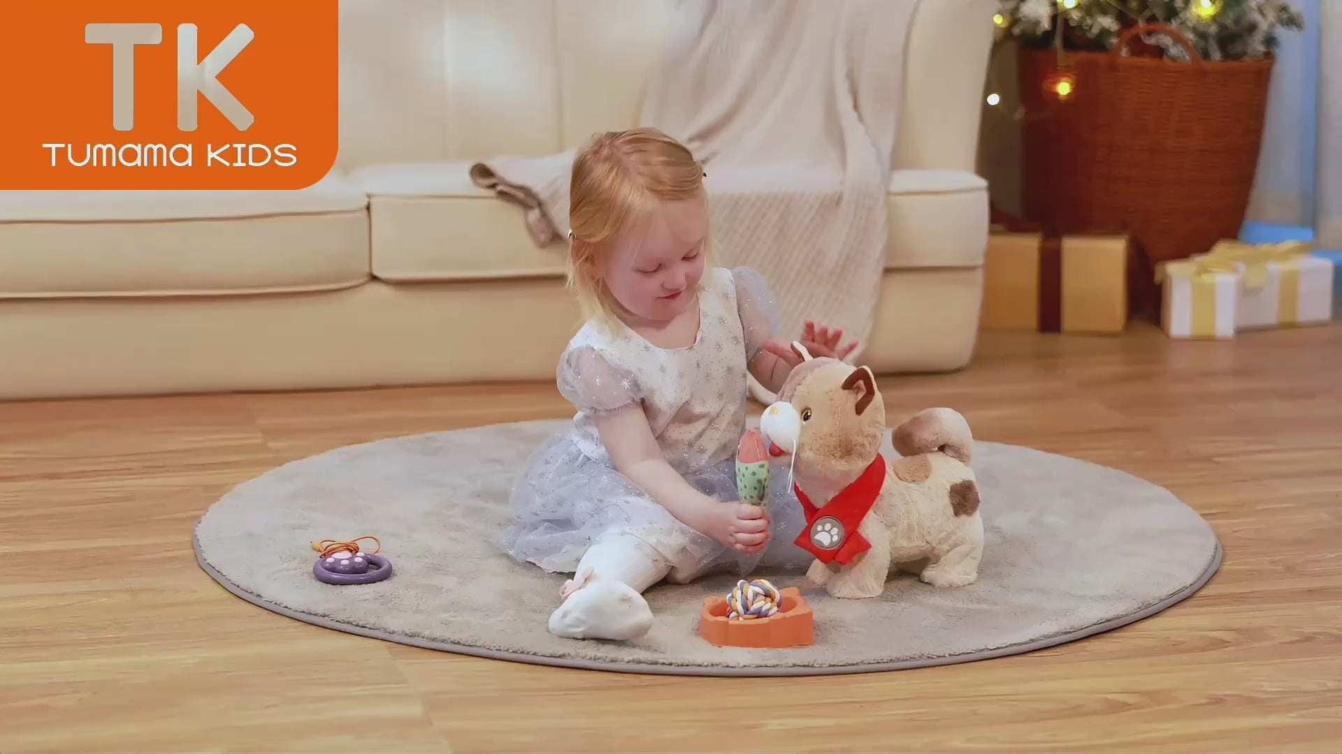 little girl interacting with the electric cat toy